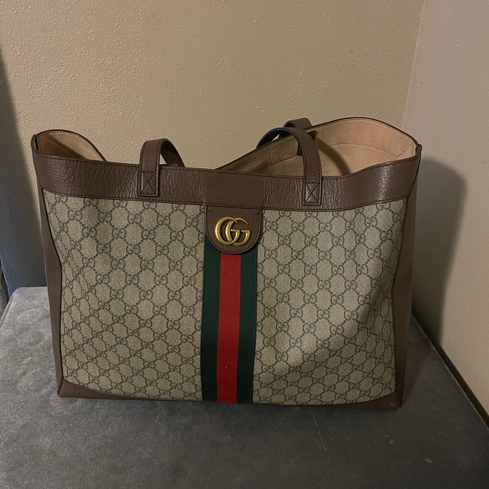 Authentic Gucci tote, lots of room, great for work, travel or everyday use.